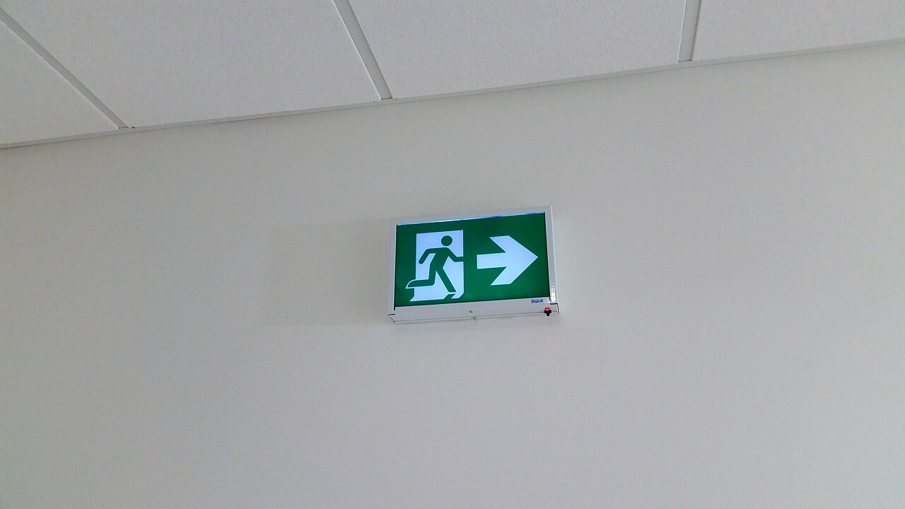 Installed Canadian running-man exit sign